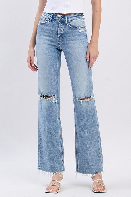 Light Wash Distressed Denim + Raw Hem